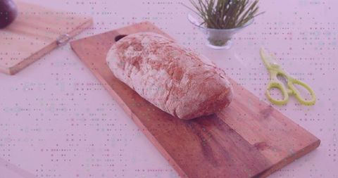 Rustic Homemade Bread Loaf on Wooden Cutting Board
