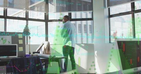 Businessman Analyzing Market Trends in Modern Office with Chart Overlays