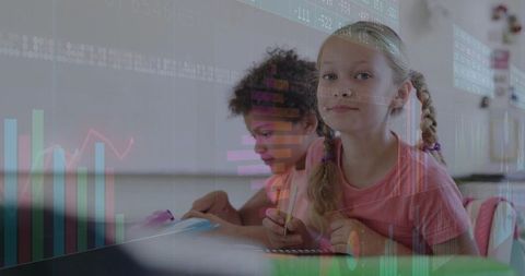 Young students writing and learning with data overlay, classroom analytics for education