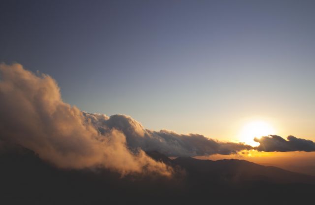 Stunning Sunrise Over Cloud-Covered Mountain Landscape - Download Free Stock Photos Pikwizard.com