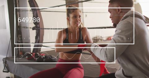 Mixed-Race Couple Training in Gym with Digital Interface Overlay - Download Free Stock Images Pikwizard.com
