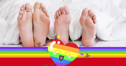 Lgbtq pride and love with rainbow flag and couple's feet
