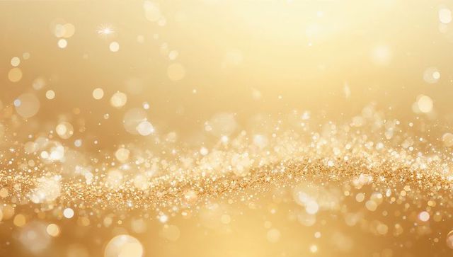 Golden glitter wave on soft bokeh backdrop with sparkling light flares for festive design