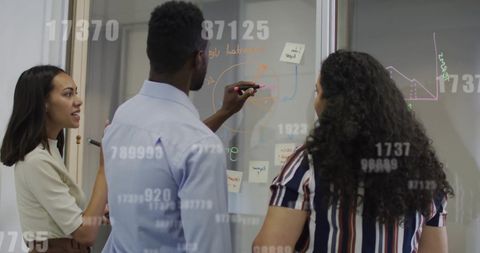 Diverse Business Team Collaborating on Data Visualization