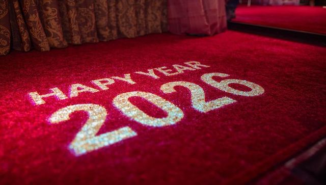 Glittering happy year 2026 projection on red carpet entrance for gala and party events