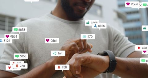 African American Man Using Smartwatch with Social Media Notifications