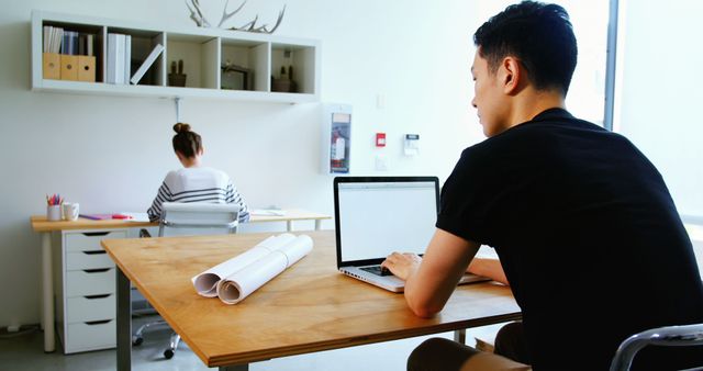 Busy Office Workspace with Professionals Using Laptop and Desktop - Download Free Stock Images Pikwizard.com