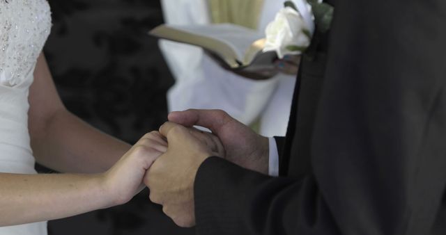 Close-Up of Bride and Groom Holding Hands During Wedding Ceremony - Download Free Stock Images Pikwizard.com