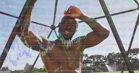 Athletic man doing pull-ups reflecting business market trends