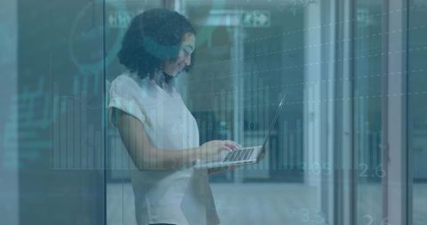 Businesswoman Analyzing Data in Modern Office for Global Finance