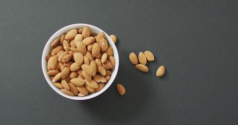 Almonds in Bowl on Grey Background for Healthy Vegan Diet - Download Free Stock Images Pikwizard.com