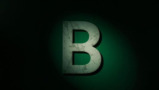 Illuminated Marble Letter B on Dark Background with Green Glow