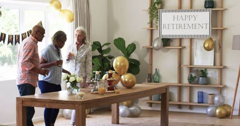 Joyful Retirement Celebration with Friends in Relaxed Home Setting