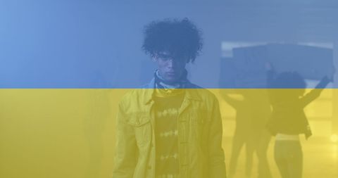 Ukrainian Flag Overlaid on Determined Protester Demonstrating