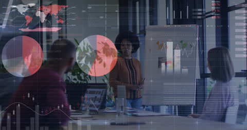 Business Team Analyzing Data with Graphical Overlays in Modern Office