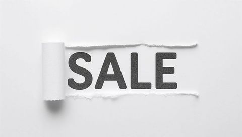 Minimal monochrome sale reveal with torn paper, rolled flap and bold typography