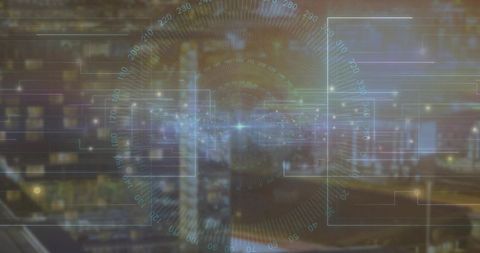 Futuristic hud interface over a cityscape at night with digital analytics