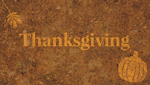 Rustic thanksgiving serif typography on leaf-litter grunge texture with pumpkin