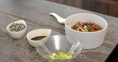 Gourmet Rice with Scallions and Sesame Seeds on Rustic Counter