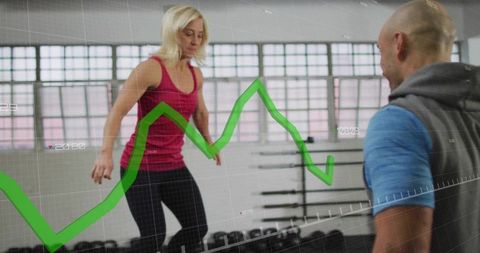 Athletic woman training with graph overlay symbolizing progress