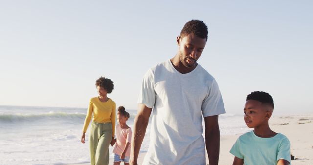 Happy African American Family Enjoying Quality Time on Beach - Download Free Stock Images Pikwizard.com