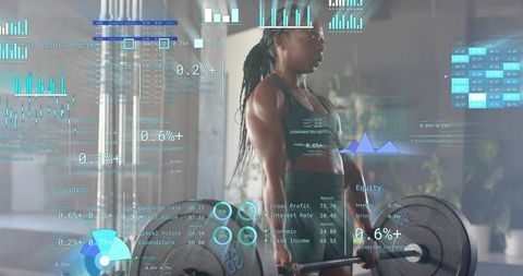 Female athlete deadlifting with holographic analytics overlay tracking strength, performance