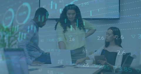 Team Analyzing Financial Data with Modern Technology in Office