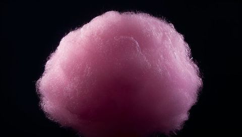 Floating Pink Cotton Candy Backlit Closeup Showing Fluffy Spun Sugar Texture