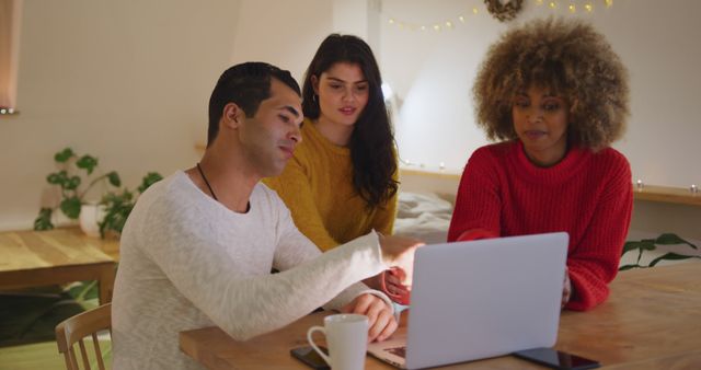 Diverse team collaborating on project in cozy home office - Download Free Stock Images Pikwizard.com