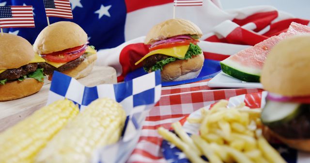 Close-up of hamburgers and french fries served on table with 4th july theme - Download Free Stock Photos Pikwizard.com