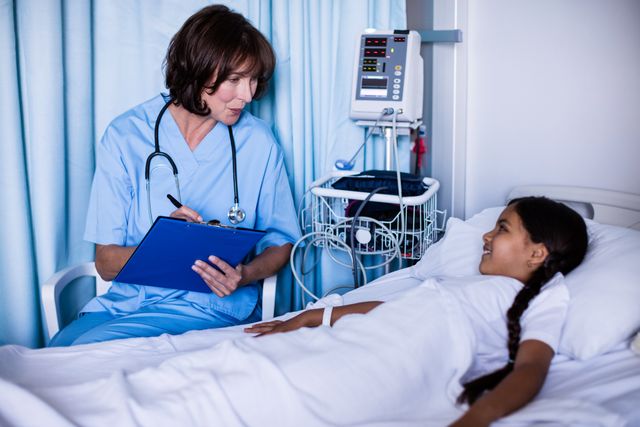 Doctor interacting with patient in hospital
