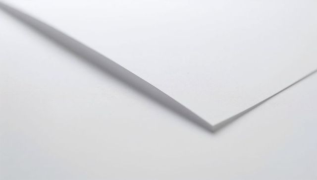 Stacking white paper creating minimal diagonal with soft shadow and clean texture