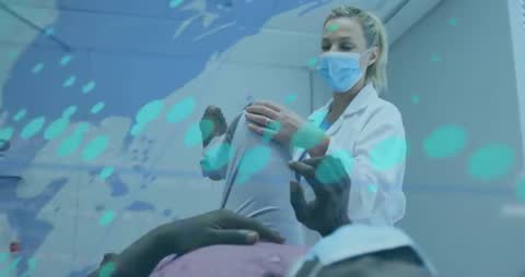 Doctor Examining Patient Augmented by Holographic Data Technology