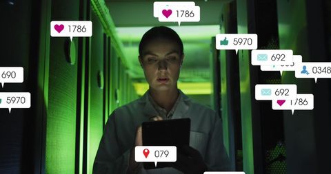 IT Technician Analyzing Data Amidst Social Media Icons in Server Room - Download Free Stock Images Pikwizard.com