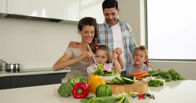 Family Cooking Together in Modern Kitchen Environment - Download Free Stock Images Pikwizard.com