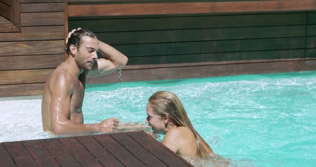 Young Couple Relaxing in Swimming Pool on Sunny Day - Download Free Stock Images Pikwizard.com