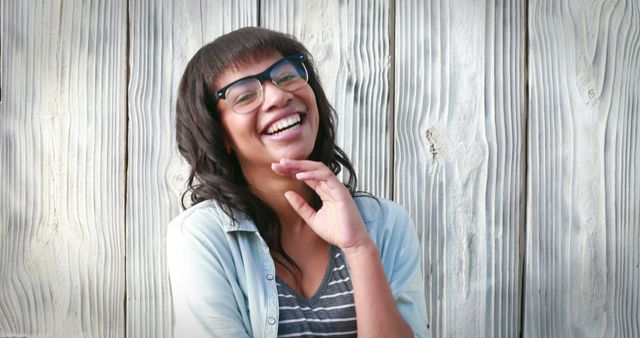 Happy Young Woman Smiling Against Wooden Background - Download Free Stock Images Pikwizard.com