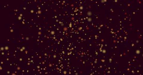 Golden Bokeh Glitter Lights on Dark Background