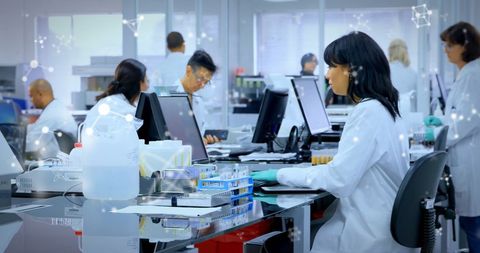 Diverse Scientists Executing Data Processing in Modern Laboratory - Download Free Stock Images Pikwizard.com