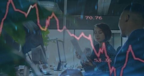 Business Team Analyzing Financial Reports and Stock Charts Ensemble