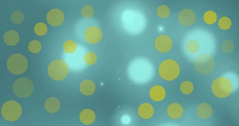 Abstract Yellow Circles on Teal Bokeh Background
