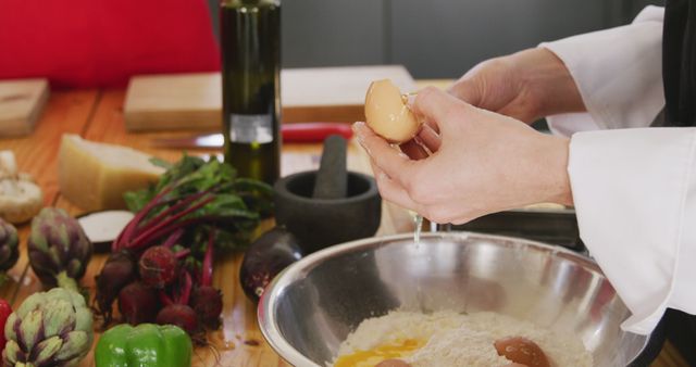 Chef Cracking Eggs into Bowl with Fresh Vegetables on Counter - Download Free Stock Images Pikwizard.com