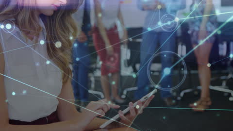 Digital Network Overlay on Businesswoman Using Tablet