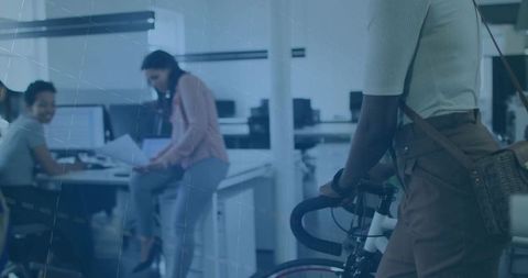 Bicycle Commuter Entering Dynamic Modern Office Workspace