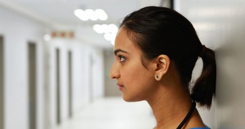 Profile of Female Doctor in Hospital Corridor - Download Free Stock Images Pikwizard.com