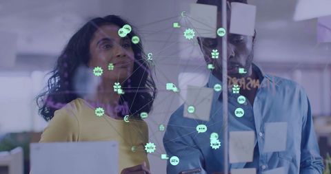 Diverse Team Brainstorming with Retail Network Hologram - Download Free Stock Images Pikwizard.com
