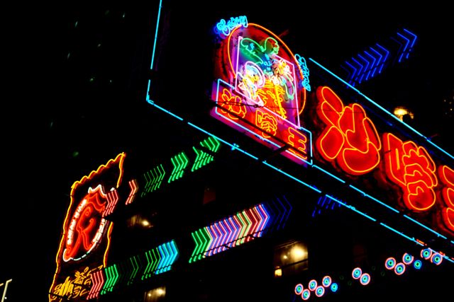 Vibrant Neon Signs Illuminating City Night - Download Free Stock Photos Pikwizard.com
