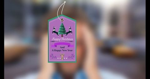 Festive purple holiday gift tag with modern design
