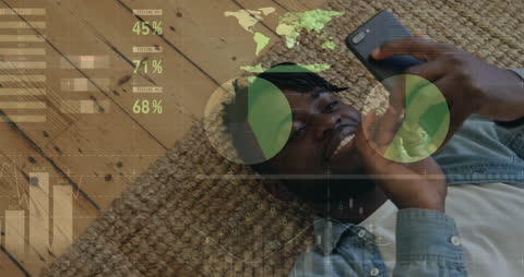 Man Lying on Floor Using Smartphone with Data Graphics Overlay