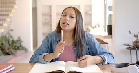 Teenage girl engaged in homework study at home
